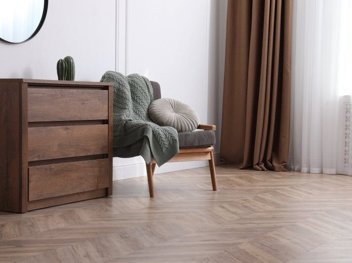 Elegant hardwood floors installed in welcoming bedroom