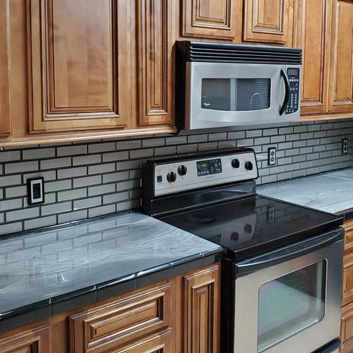 Tile countertop and backsplash in West Plains, MO Tile countertop and backsplash in West Plains, MO